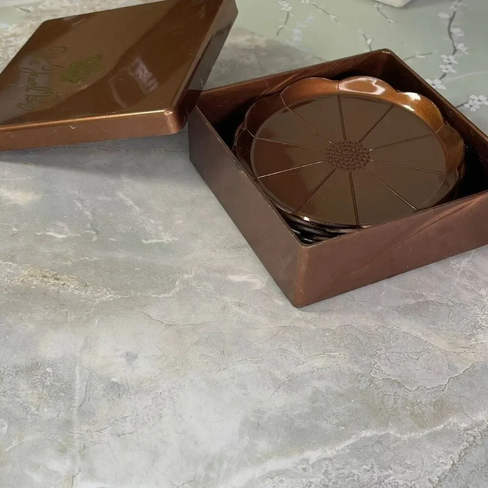 Vintage Midcentury Steeds The Jewel Box coaster set copper colored plastic.